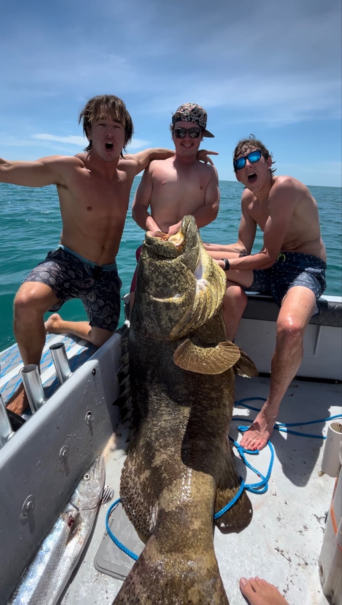 Captain Croix with a giant goliath grouper offshore Naples